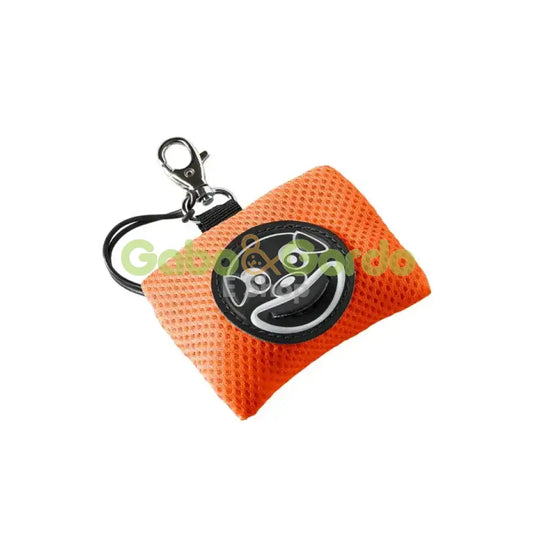 Dispensador TRE PONTI Smile Dog naranja para bolsas de perros, silencioso y práctico