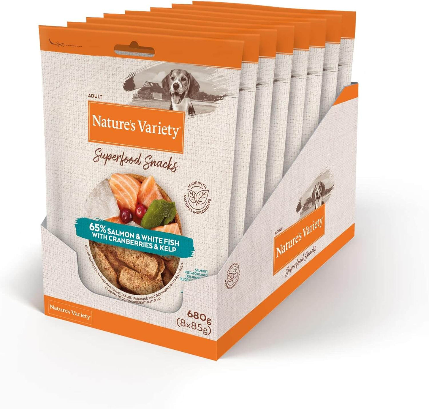 Snack natural para perro adulto Nature’s Variety con salmón, pescado blanco y superfoods, cocido al horno y bajo en calorías.