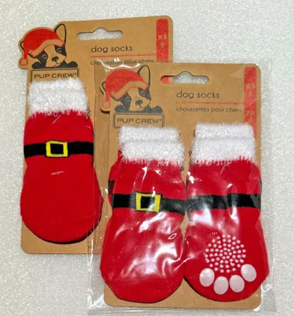 Calcetines navideños para perro Pup Crew con diseño de Papá Noel y suela antideslizante en color rojo y blanco