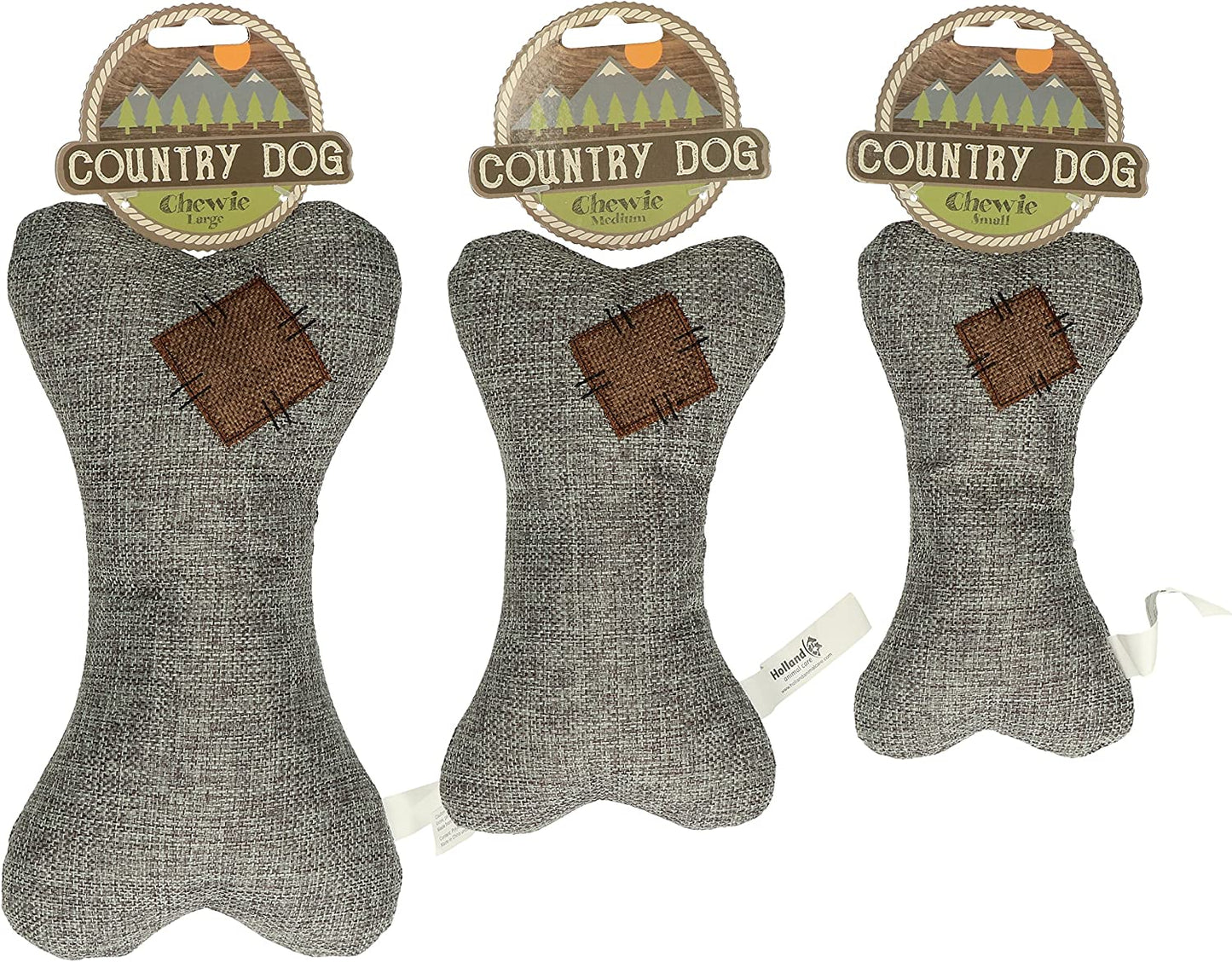 Perro jugando con el juguete de peluche Country Dog Chewie ecológico